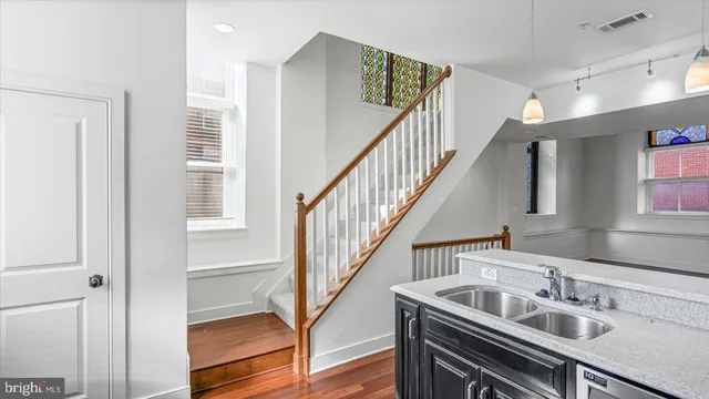 a view of kitchen and sink