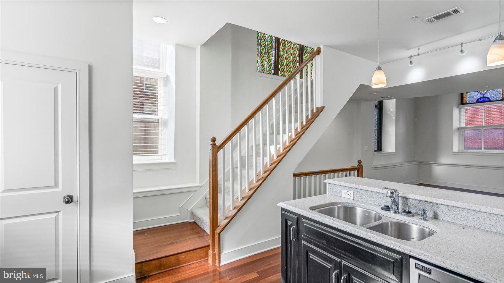 1100 North Calvert Street, Unit 2 Baltimore, MD 21202 - Photo 8 of 34 a view of kitchen and sink