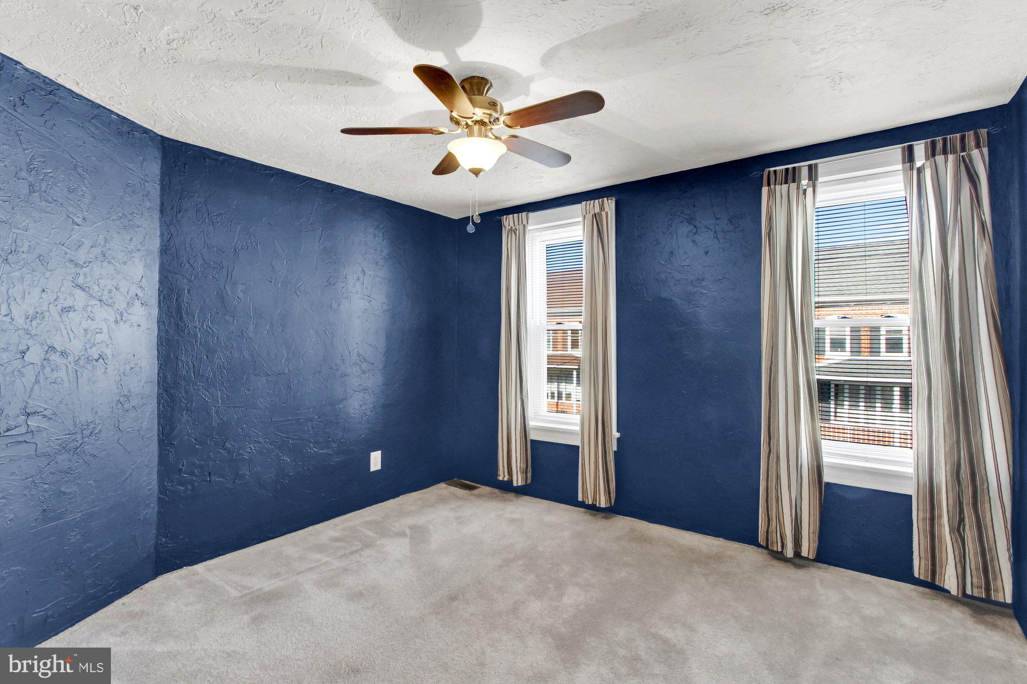 2861 Centennial Road Hanover, PA 17331 - Photo 15 of 26 a view of a livingroom with a ceiling fan and window