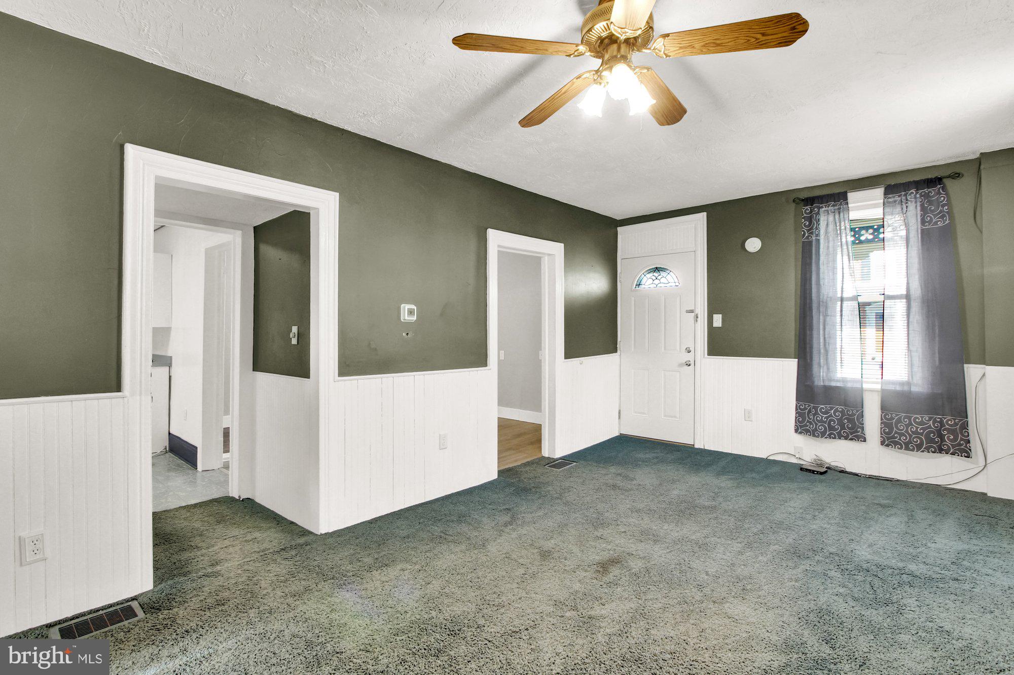 2861 Centennial Road Hanover, PA 17331 - Photo 4 of 26 an empty room with fan and windows