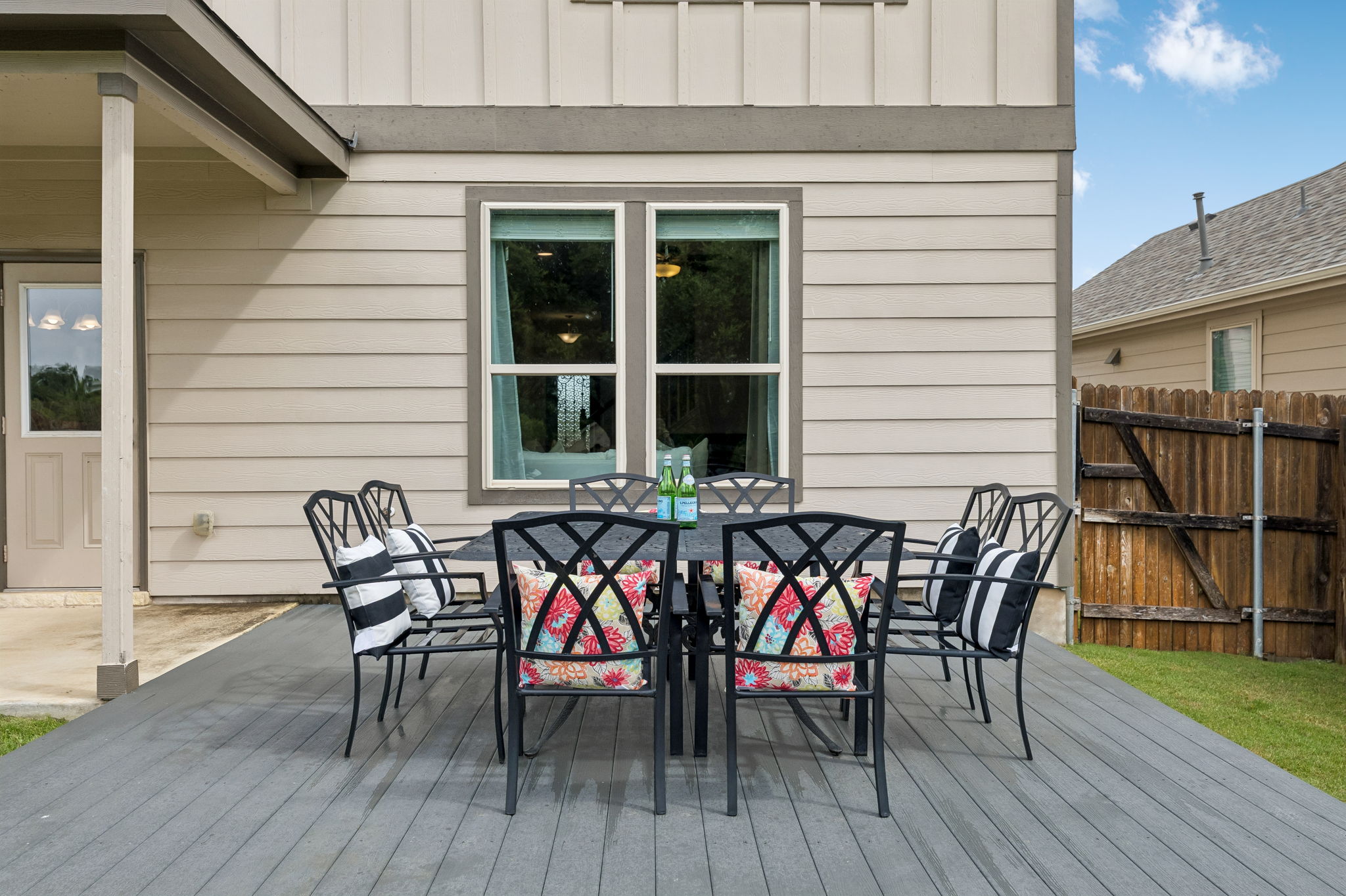 809 Whitman Avenue Georgetown, TX 78626 - Photo 32 of 35 a view of deck with table and chairs and wooden floor