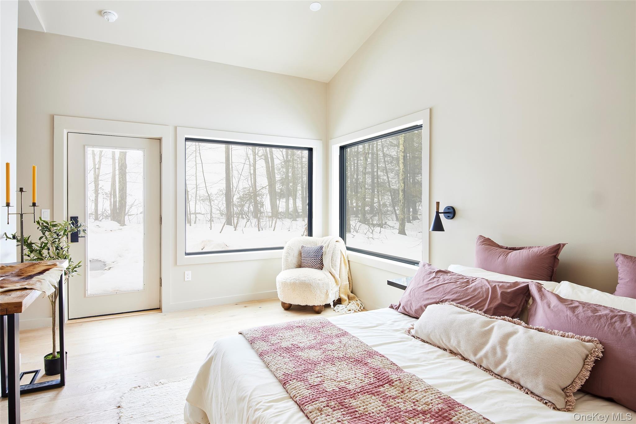 305 Old Danzer Road Livingston Manor, NY 12758 - Photo 11 of 30 a bedroom with a large bed and a large window