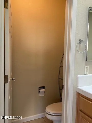 a bathroom with a toilet