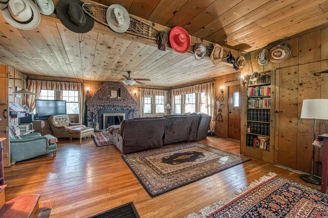 a kitchen with stainless steel appliances a sink and cabinets
