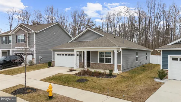a front view of a house with entertaining space