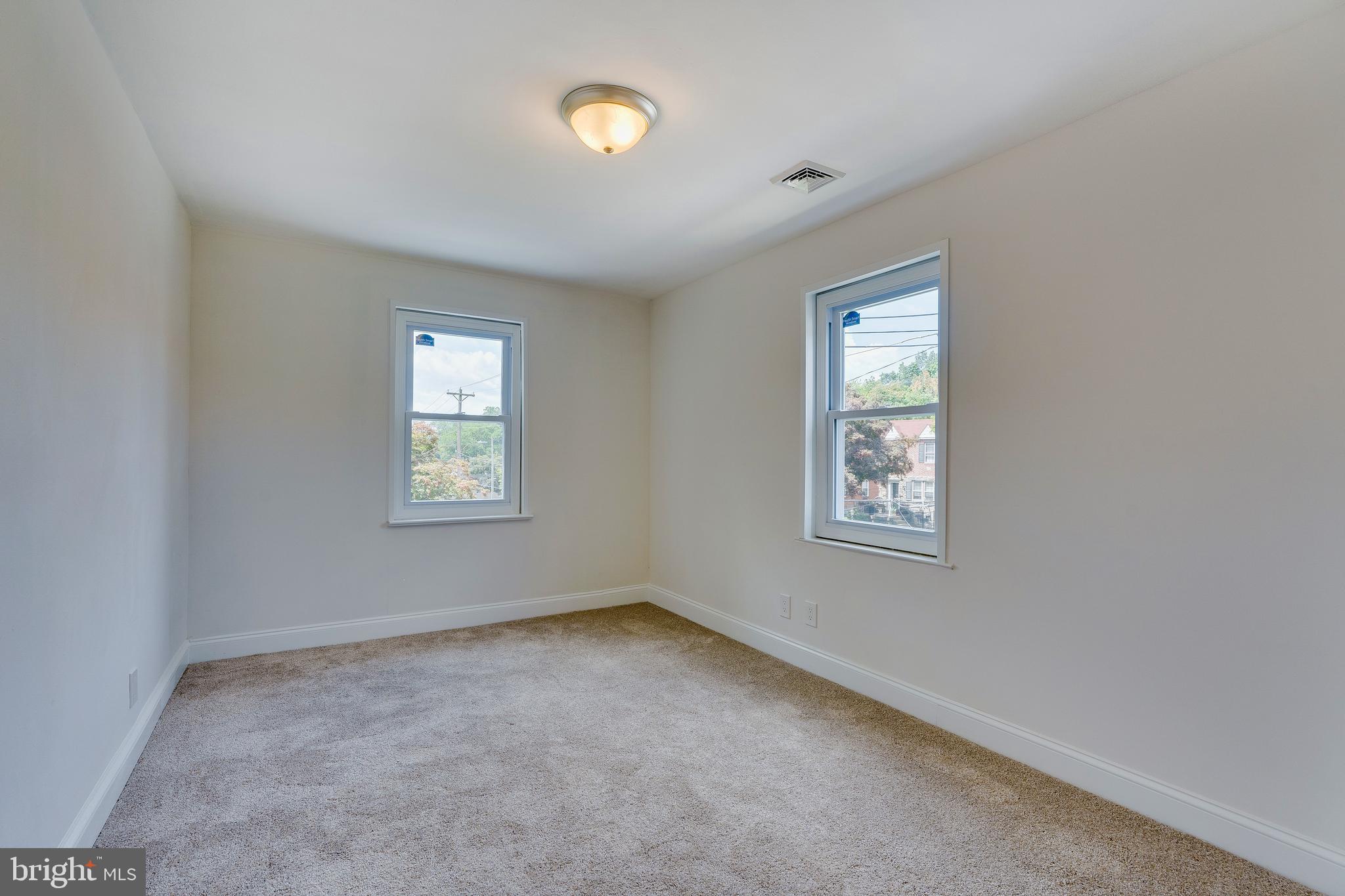 44 Greenhill Road Media, PA 19063 - Photo 22 of 34 an empty room with windows