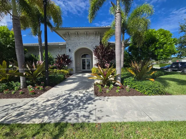 a front view of a house with a porch