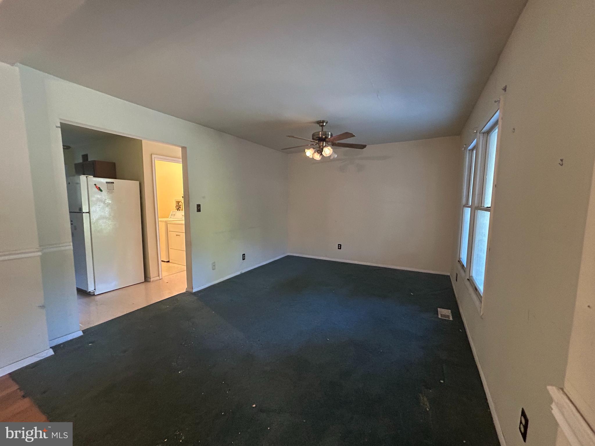 15325 Holly Grove Road Silver Spring, MD 20905 - Photo 17 of 27 wooden floor in an empty room