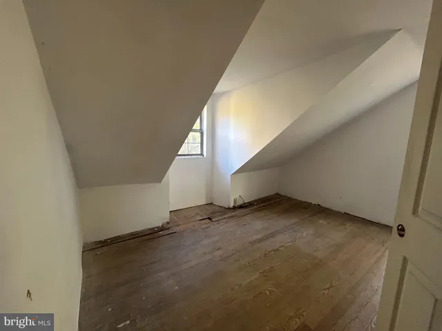 a bathroom with a sink mirror toilet and bathtub