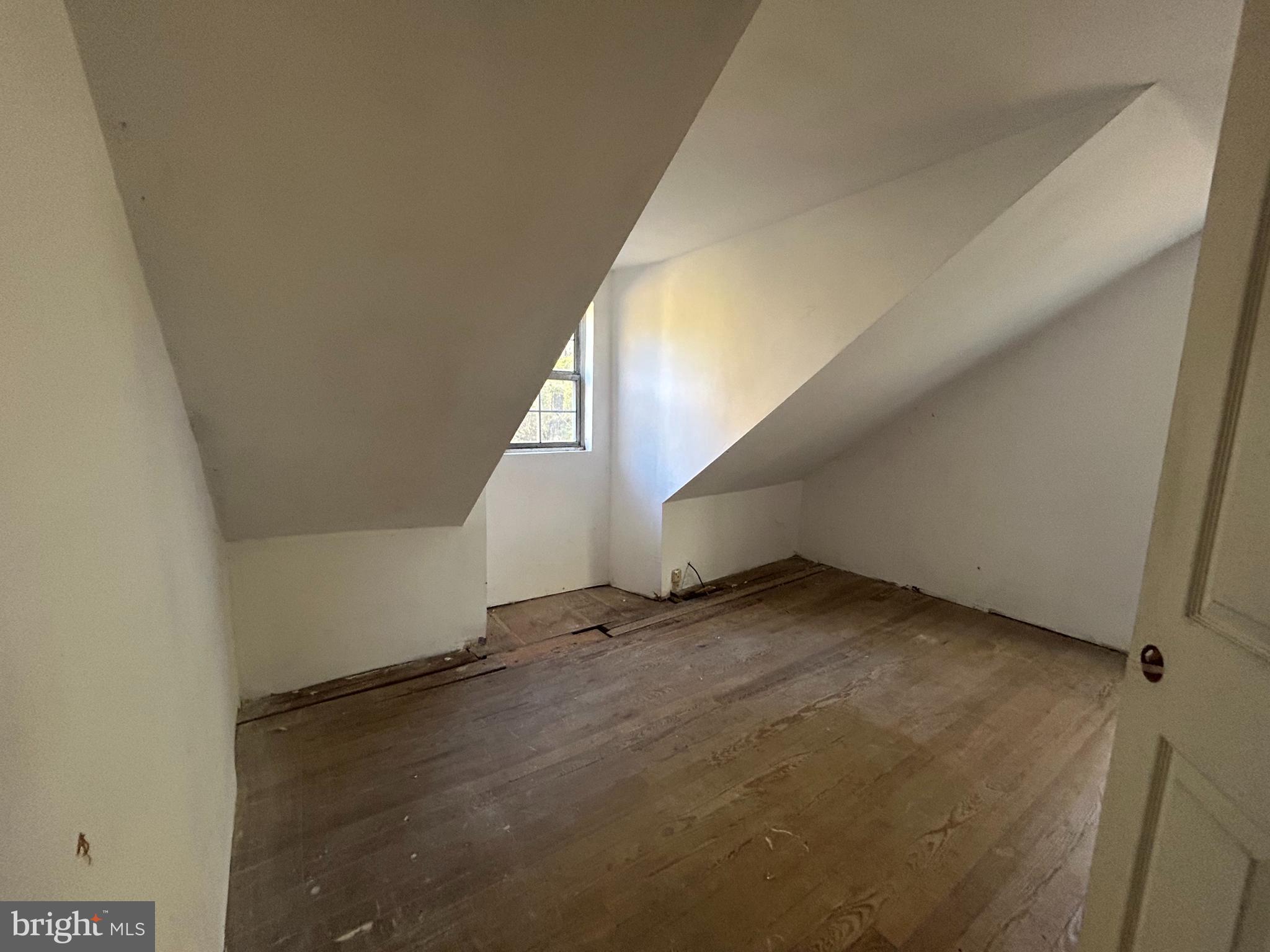 15325 Holly Grove Road Silver Spring, MD 20905 - Photo 22 of 27 a view of an empty room