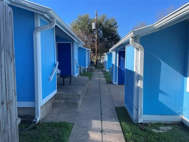 a view of a back yard of the house