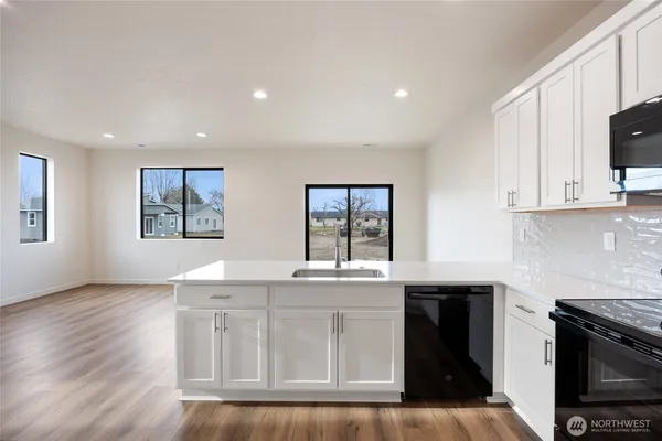 a bathroom with a sink and vanity