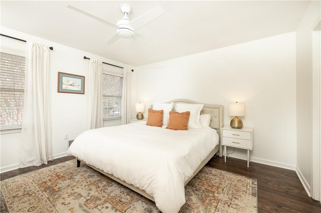 1101 Collier Road Northwest, Unit A4 Atlanta, GA 30318 - Photo 20 of 27 a bedroom with a bed and a window