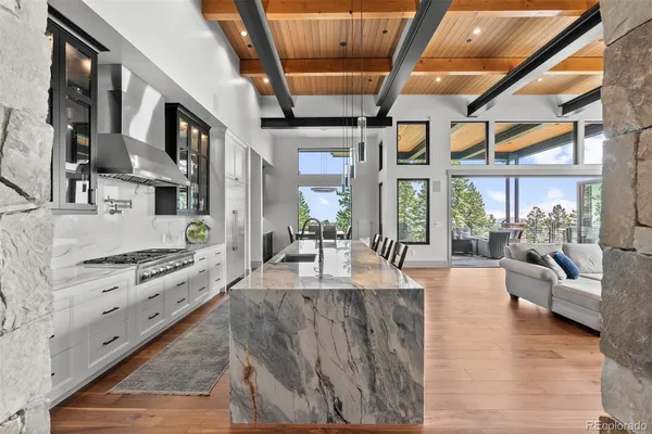 a large living room with stainless steel appliances granite countertop lots of counter top space