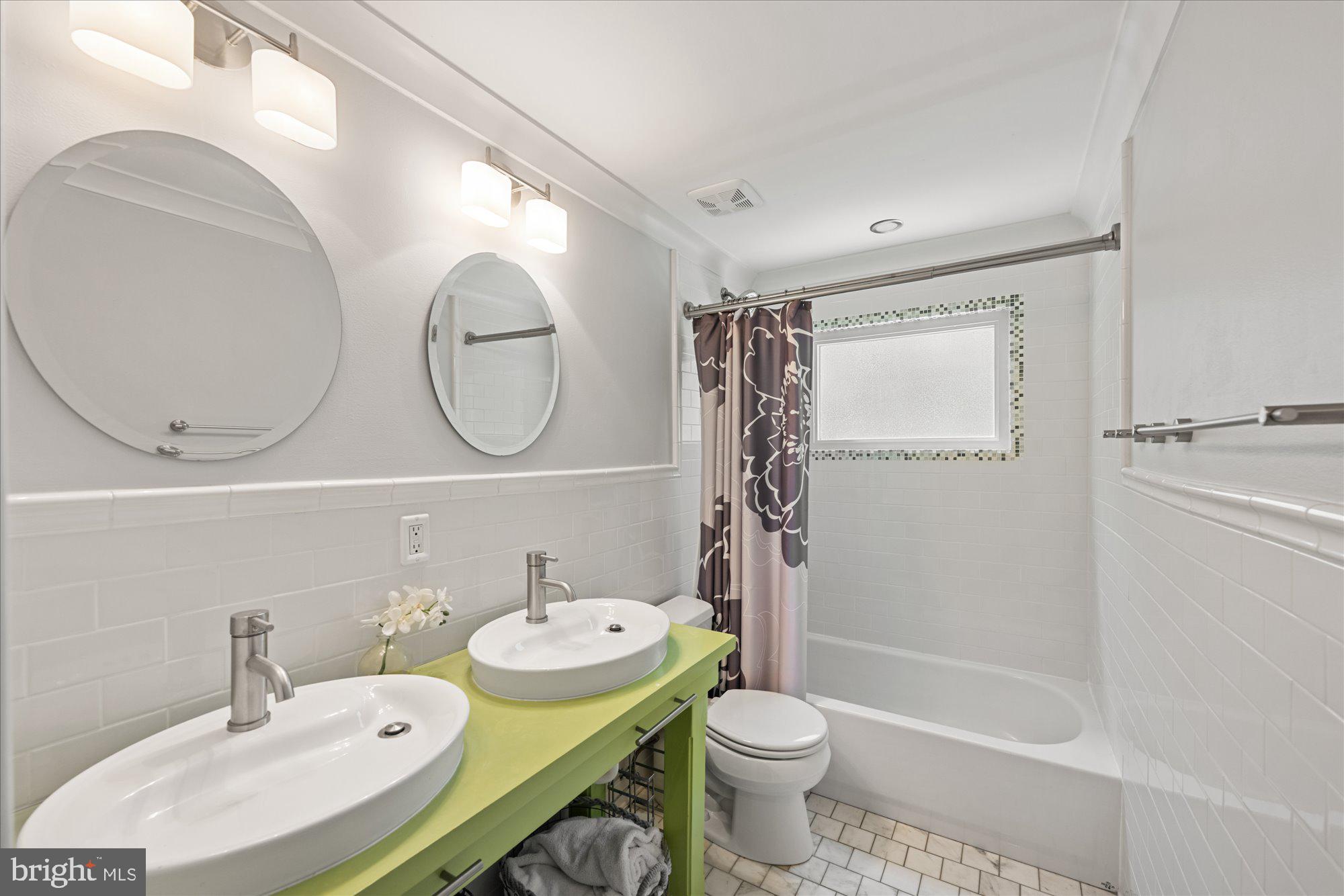 11448 Schuylkill Road Rockville, MD 20852 - Photo 28 of 49 upstairs whimsical Bath #2 -tub and dual vanity