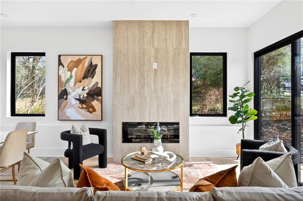 1348 Finley Street Northeast Atlanta, GA 30307 - Photo 11 of 47 a living room with furniture and a large window