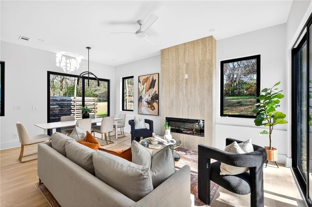 1348 Finley Street Northeast Atlanta, GA 30307 - Photo 12 of 47 a living room with furniture and a large window