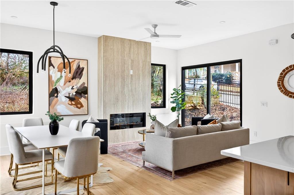 1348 Finley Street Northeast Atlanta, GA 30307 - Photo 13 of 47 a living room with furniture fireplace and a large window