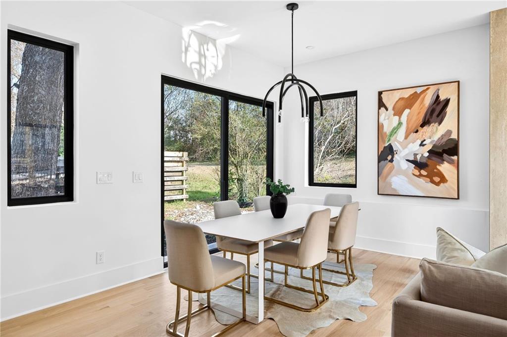 1348 Finley Street Northeast Atlanta, GA 30307 - Photo 14 of 47 a view of a dining room with furniture window and outside view