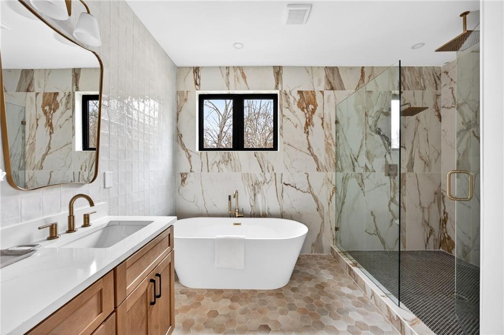 1348 Finley Street Northeast Atlanta, GA 30307 - Photo 19 of 47 a bathroom with a sink and a mirror