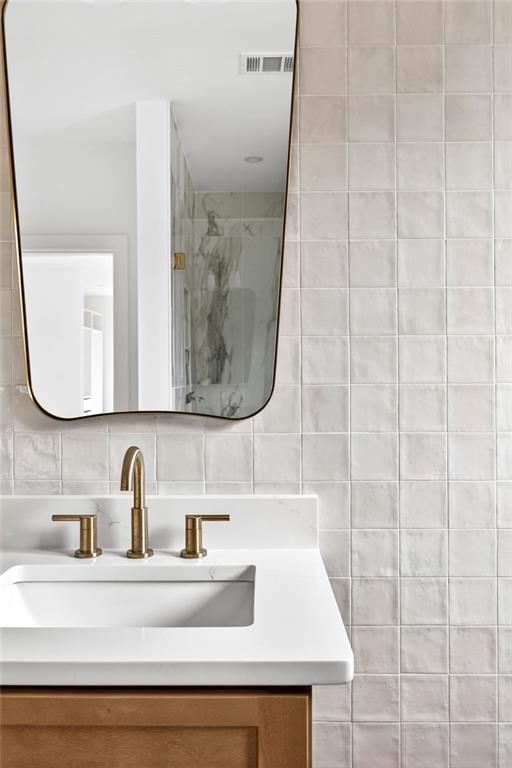 1348 Finley Street Northeast Atlanta, GA 30307 - Photo 25 of 47 a bathroom with a sink and a mirror