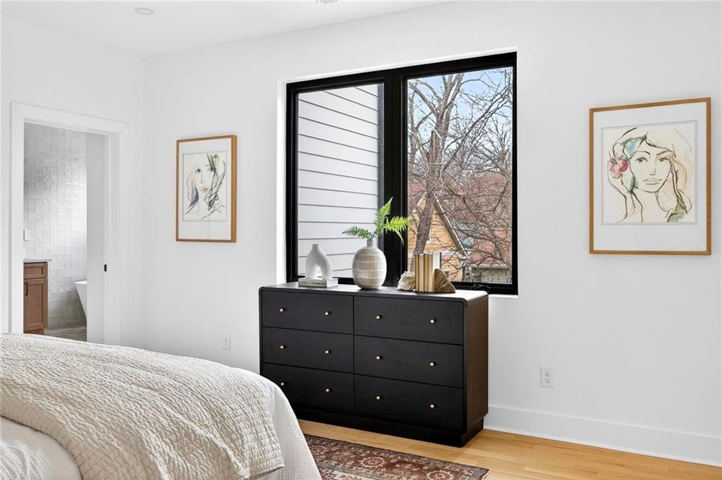 1348 Finley Street Northeast Atlanta, GA 30307 - Photo 26 of 47 a bedroom with a bed and a window