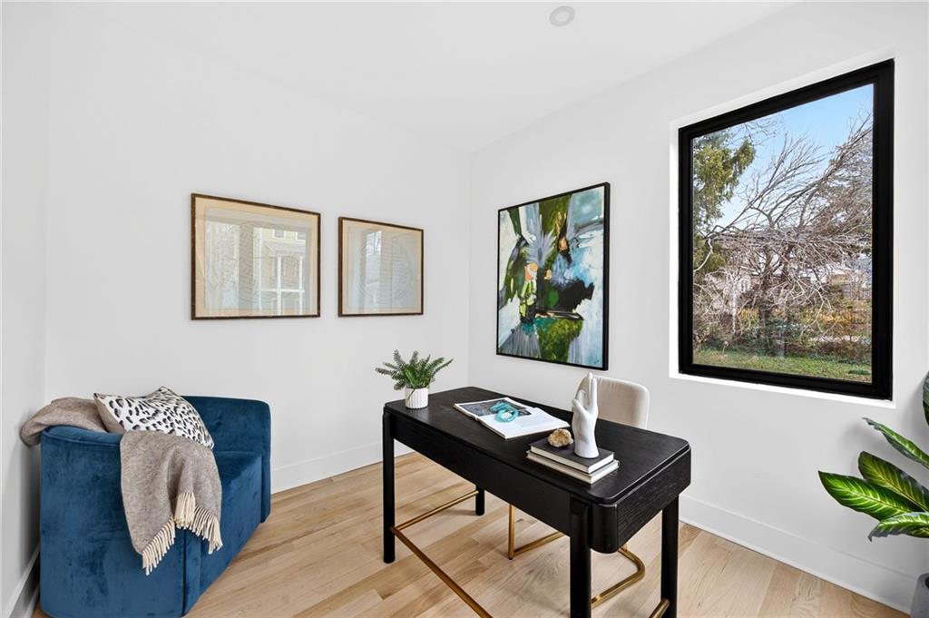 1348 Finley Street Northeast Atlanta, GA 30307 - Photo 30 of 47 a view of a workspace with furniture and a potted plant