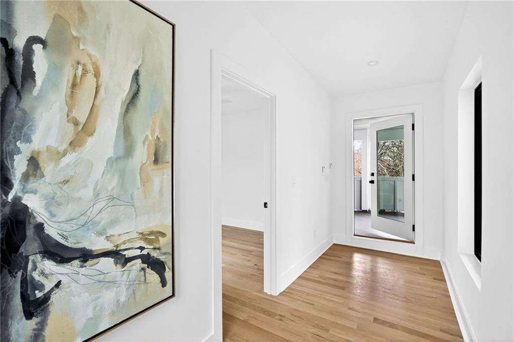 1348 Finley Street Northeast Atlanta, GA 30307 - Photo 38 of 47 a view of a hallway with wooden floor and closet