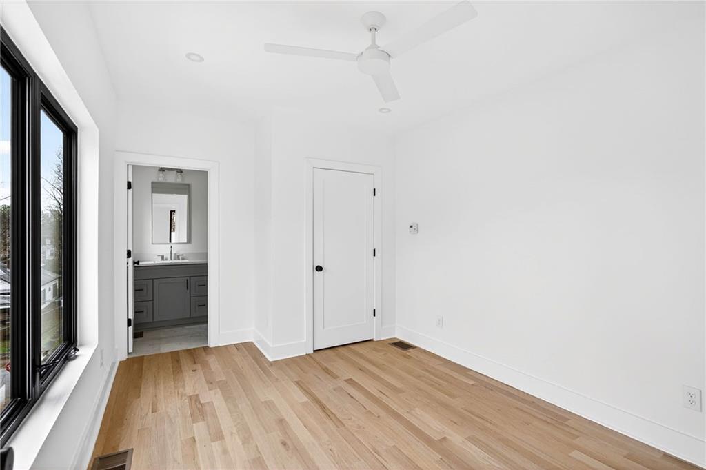 1348 Finley Street Northeast Atlanta, GA 30307 - Photo 39 of 47 a view of a room with wooden floor and a hallway