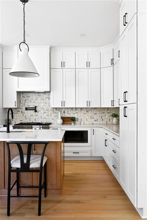 1348 Finley Street Northeast Atlanta, GA 30307 - Photo 9 of 47 a kitchen with white cabinets and white appliances