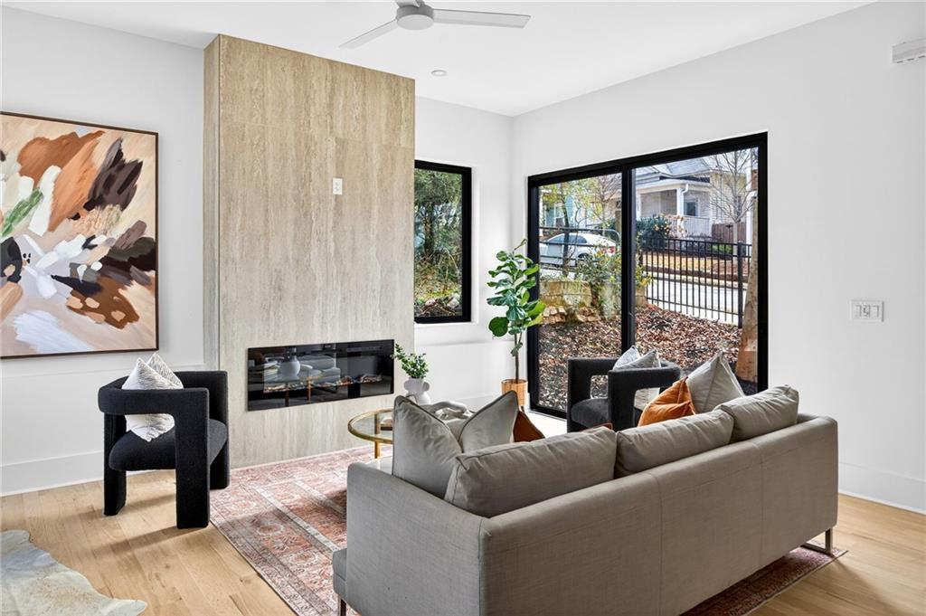 1348 Finley Street Northeast Atlanta, GA 30307 - Photo 10 of 47 a living room with furniture and a large window