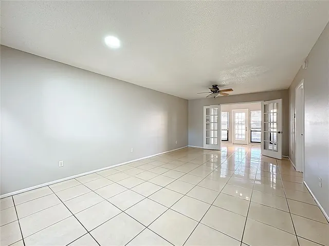 a view of an empty room and window