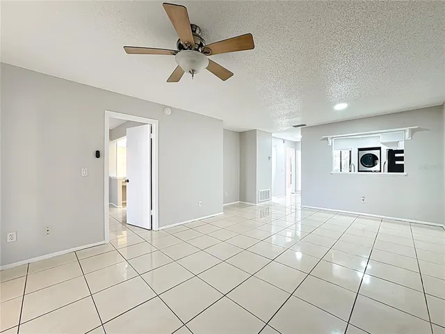 a view of an empty room and window