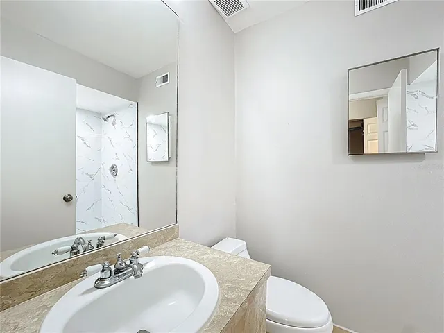 a close view of shower tap