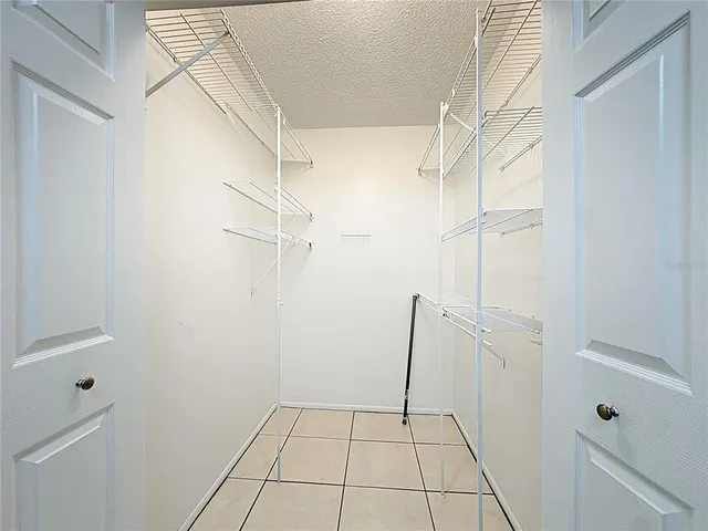 a view of a hallway with washer and dryer