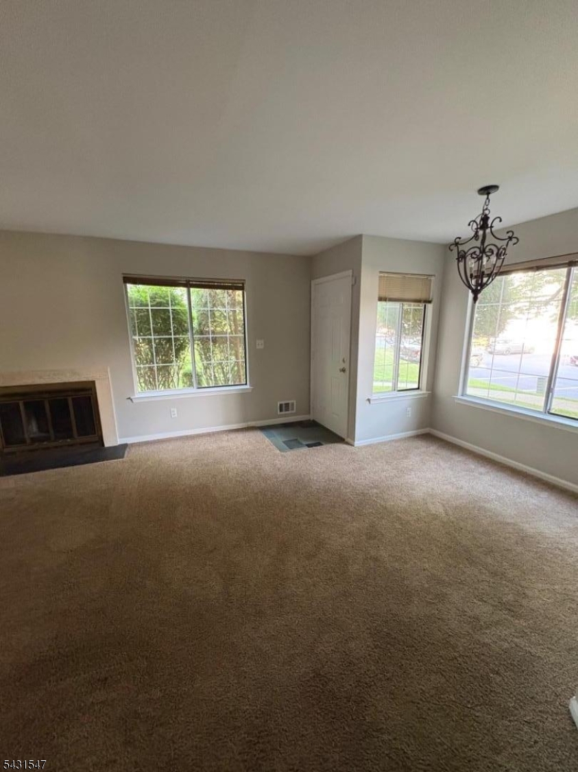 9 Pendleton Court Bedminster, NJ 07921 - Photo 3 of 22 a view of empty room with window