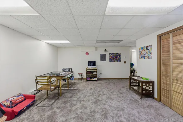 a view of bathroom with a sink a mirror and a shower