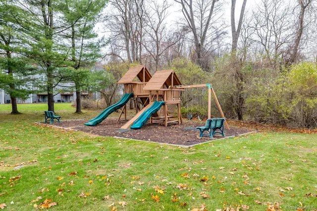 a view of outdoor space with trees all around