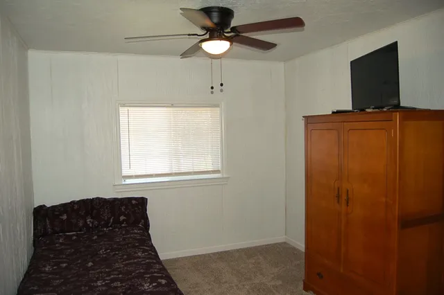 a bathroom with a sink a bathtub and a mirror