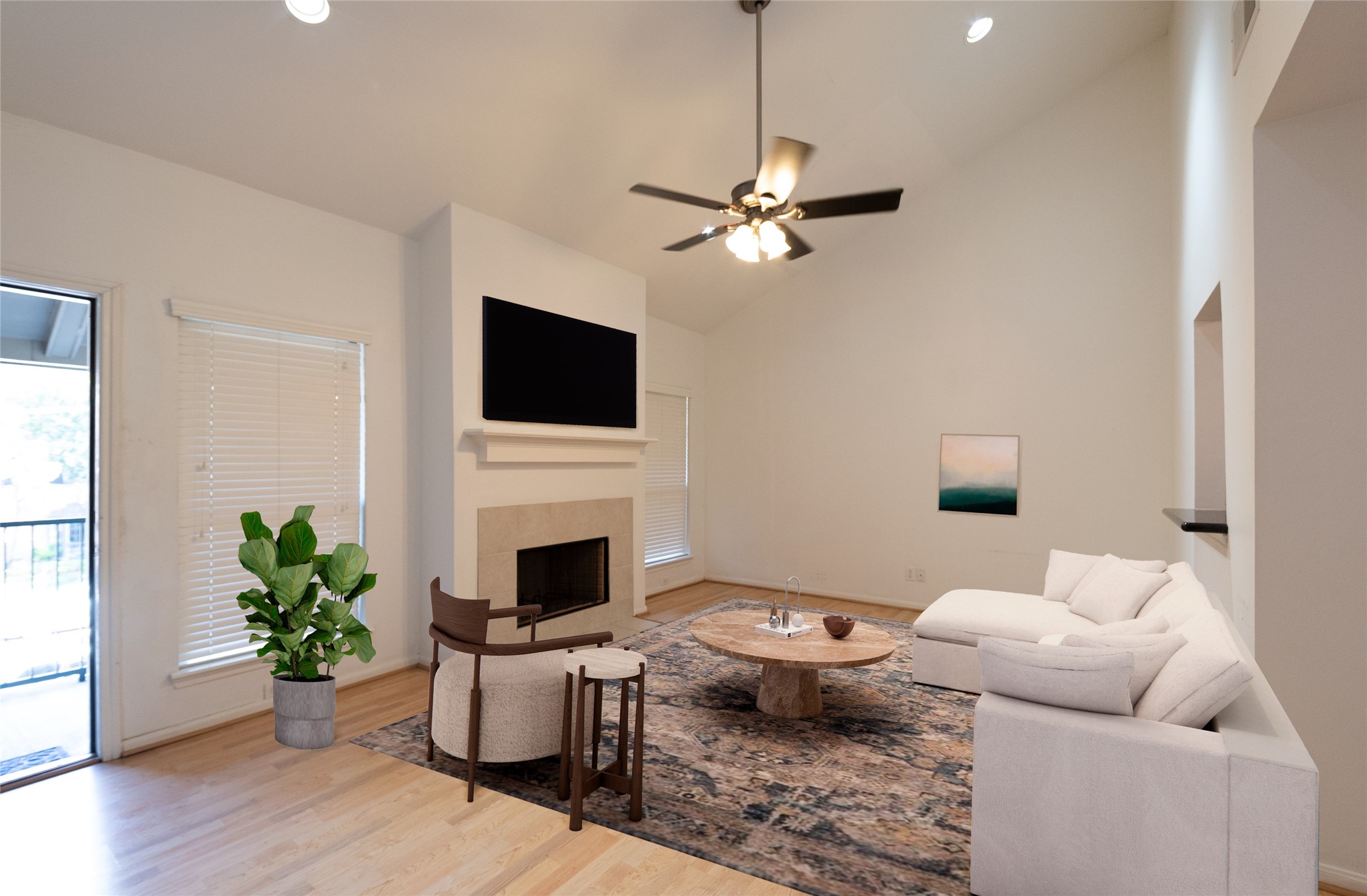 1100 Augusta Drive, Unit 76 Houston, TX 77057 - Photo 1 of 12 a living room with furniture a fireplace and a potted plant