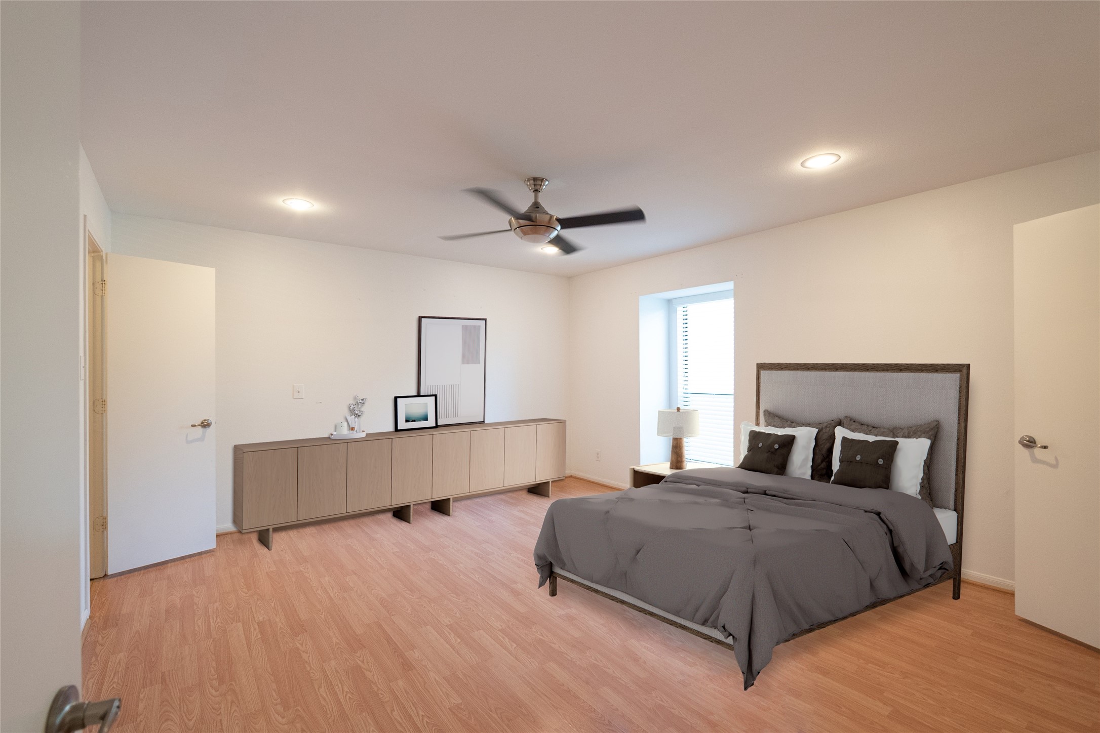 1100 Augusta Drive, Unit 76 Houston, TX 77057 - Photo 6 of 12 a bedroom with a bed and window