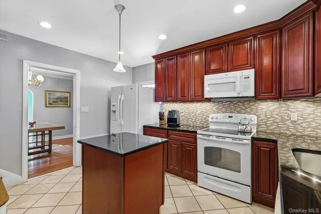 $1,075,000 | 164-37 Grand Central Parkway | Hillcrest