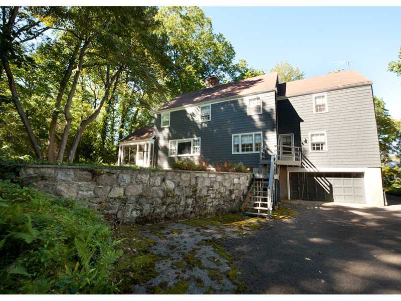 Undisclosed Address Riverside, CT 06878 - Photo 2 of 8 a view of a house with a yard