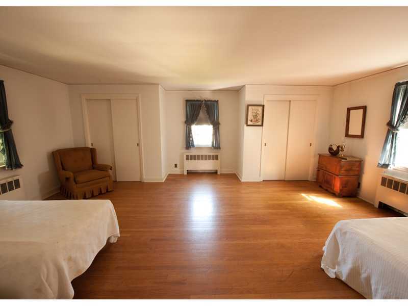 Undisclosed Address Riverside, CT 06878 - Photo 7 of 8 a living room with furniture and a window