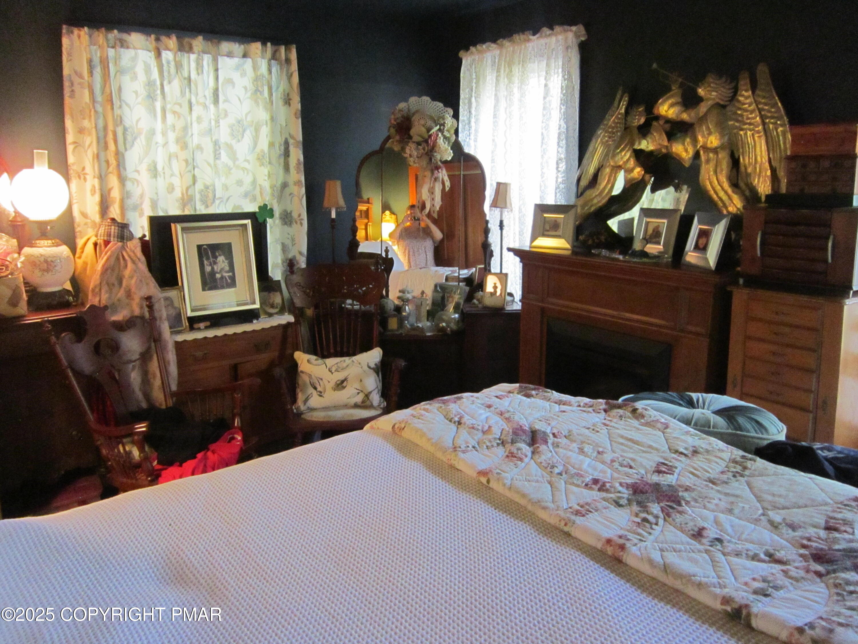 642 Tulip Tree Lane Cresco, PA 18326 - Photo 14 of 40 a bedroom with a bed and a mirror