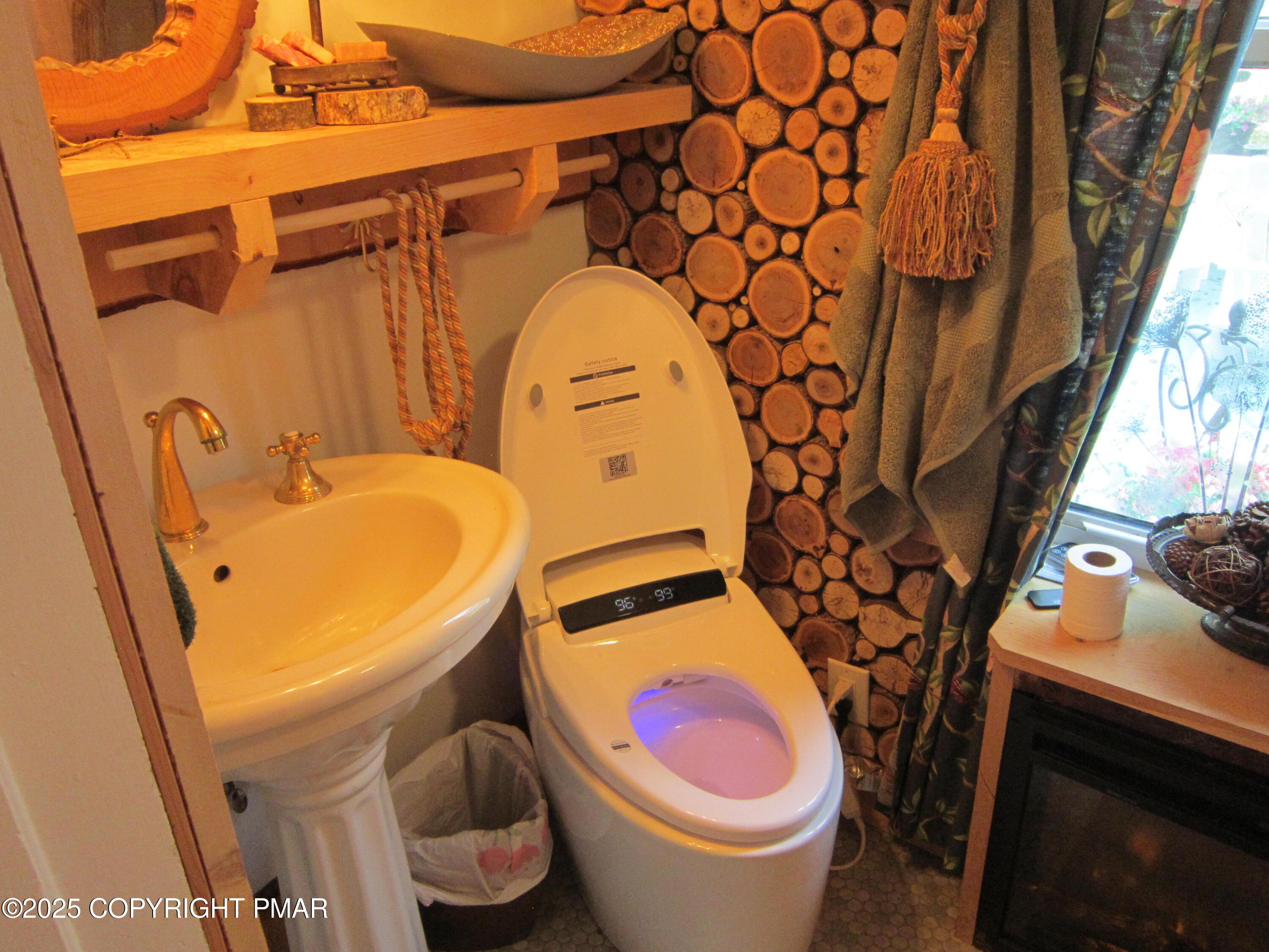 642 Tulip Tree Lane Cresco, PA 18326 - Photo 19 of 40 a bathroom with a sink toilet and mirror