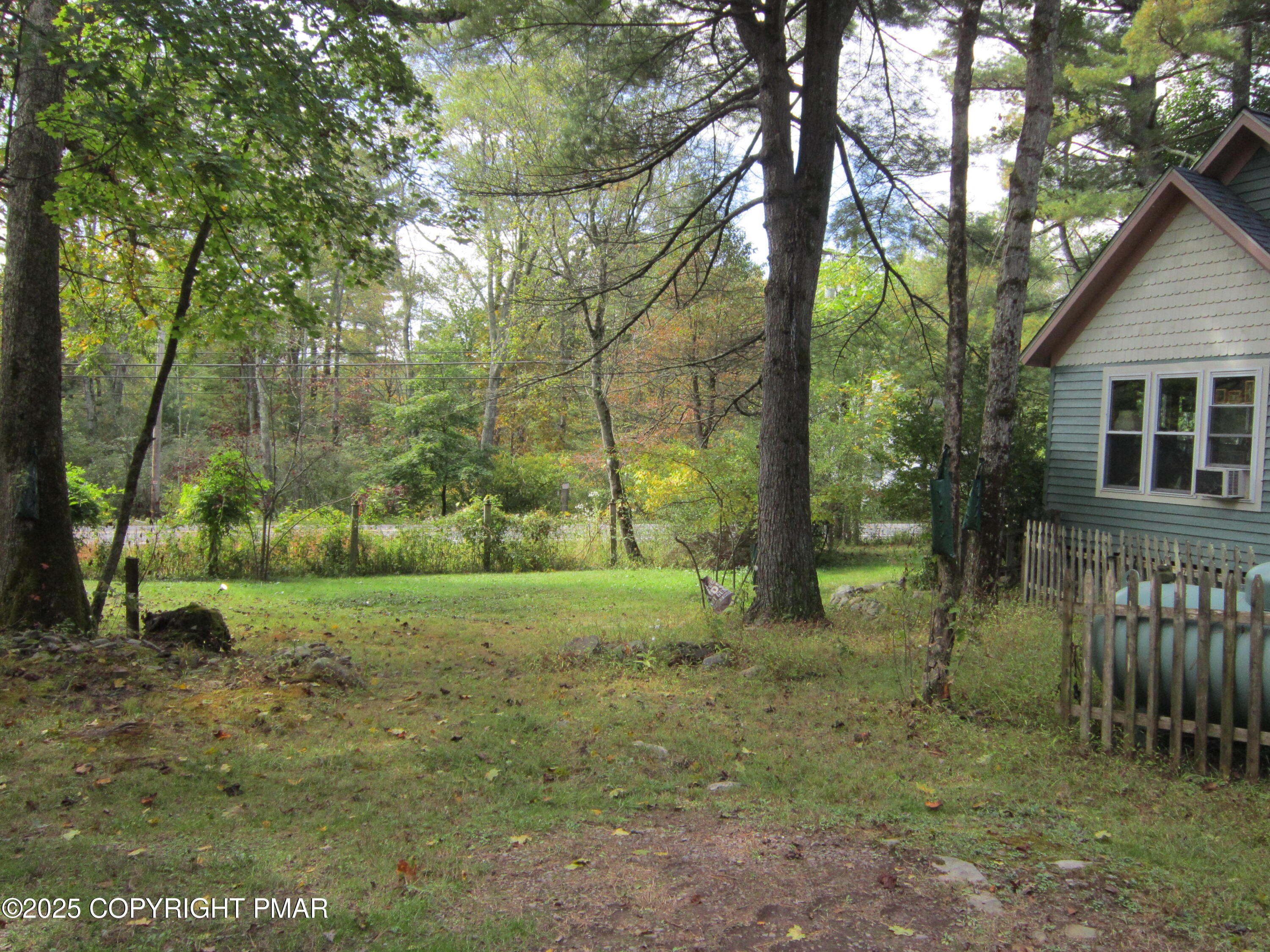642 Tulip Tree Lane Cresco, PA 18326 - Photo 32 of 40 a view of a house with a yard