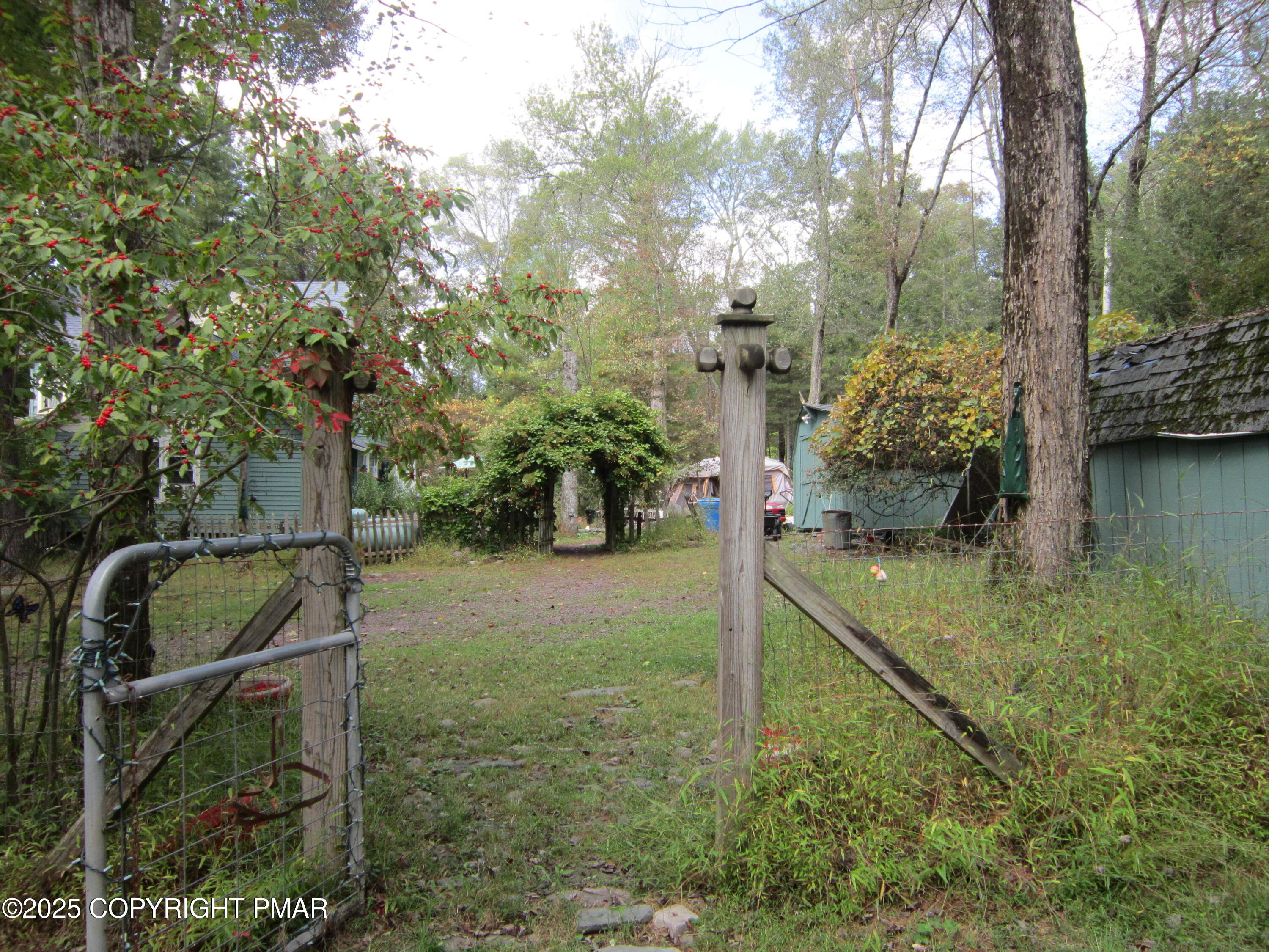 642 Tulip Tree Lane Cresco, PA 18326 - Photo 33 of 40 a backyard of a house with lots of green space
