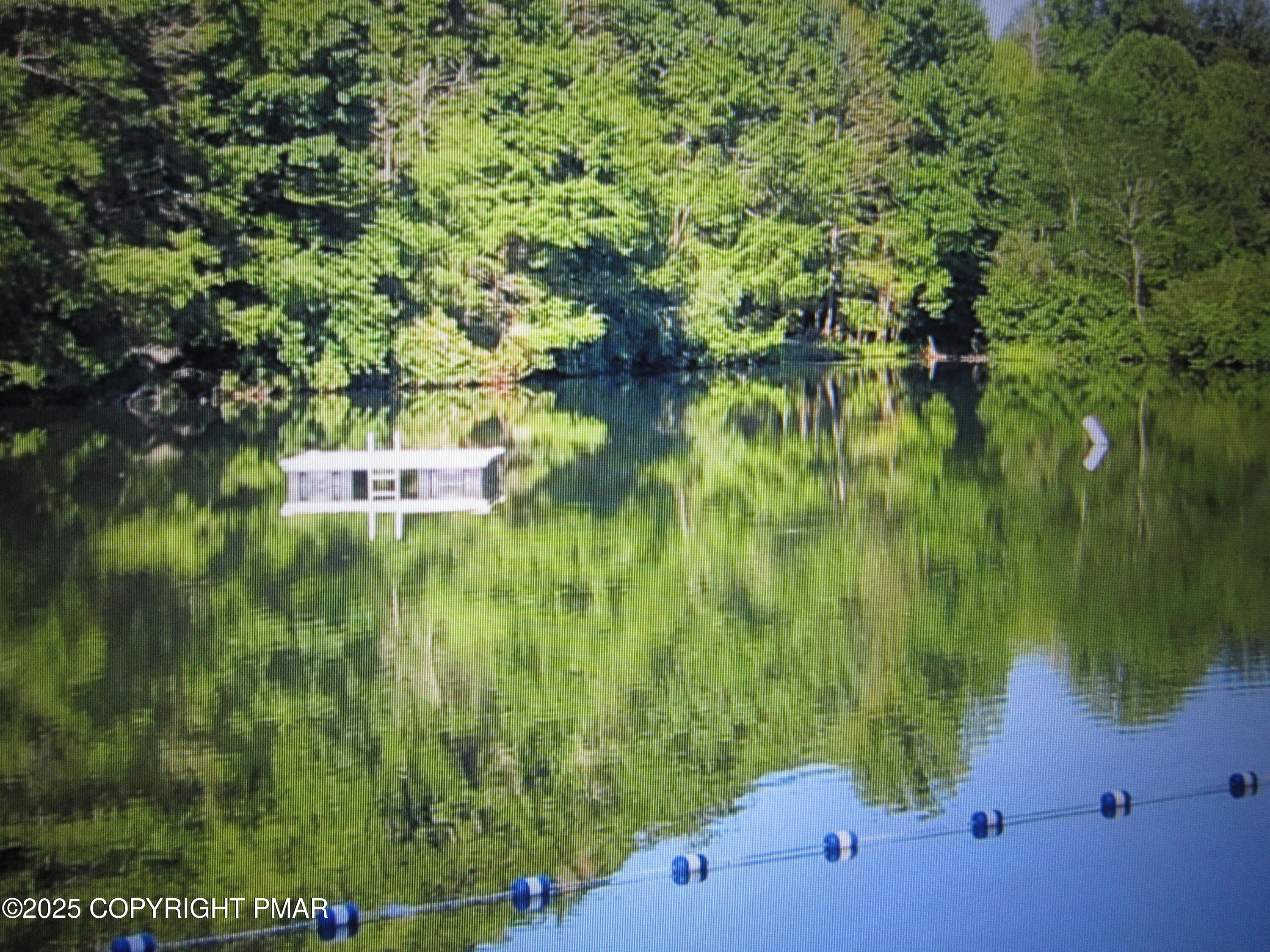 642 Tulip Tree Lane Cresco, PA 18326 - Photo 35 of 40 a view of lake background with house
