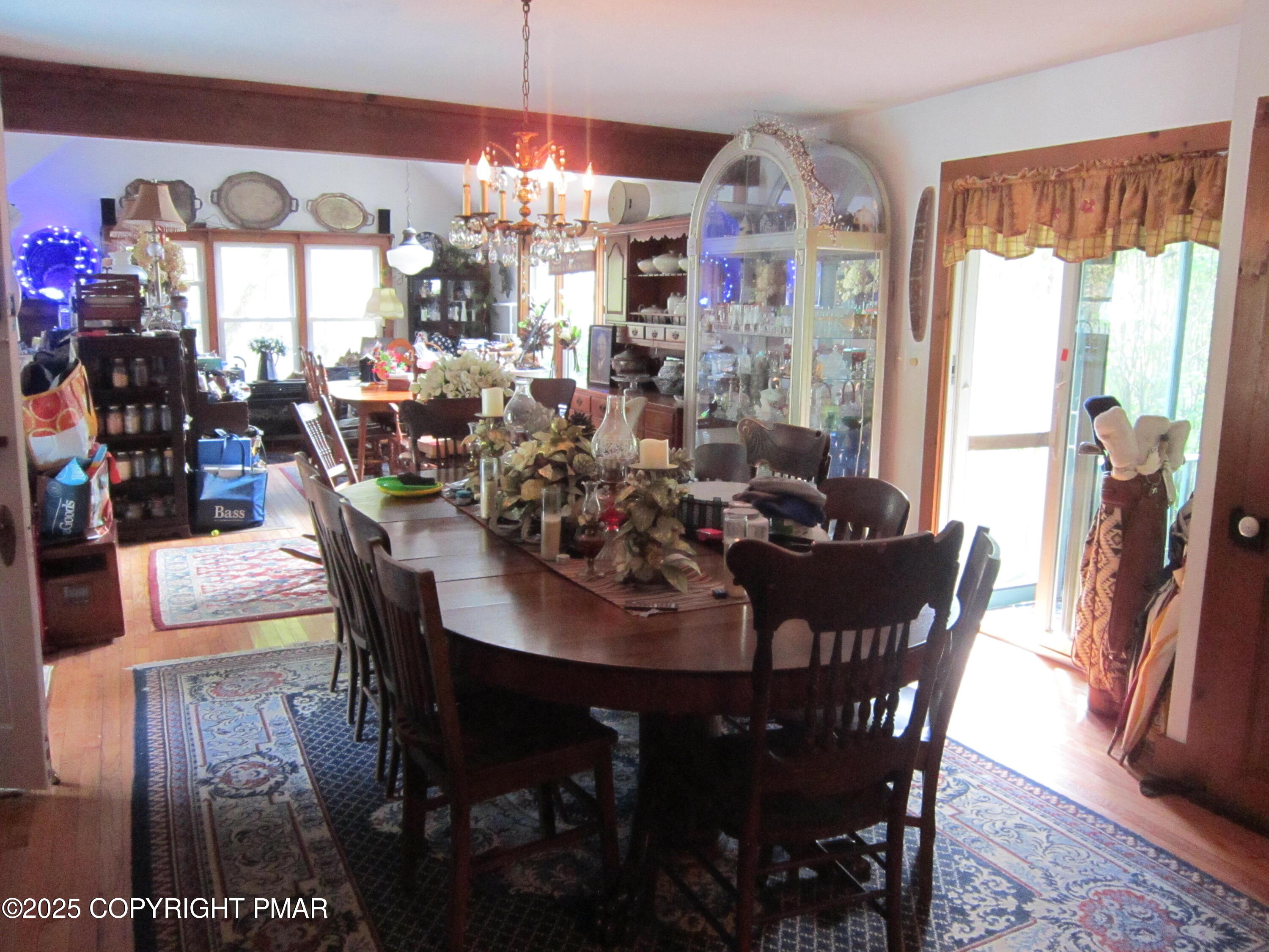 642 Tulip Tree Lane Cresco, PA 18326 - Photo 8 of 40 a view of a dining room with furniture window and outside view